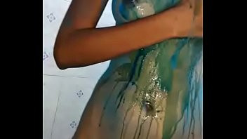Play Indian girlfriend bathing after playing holi